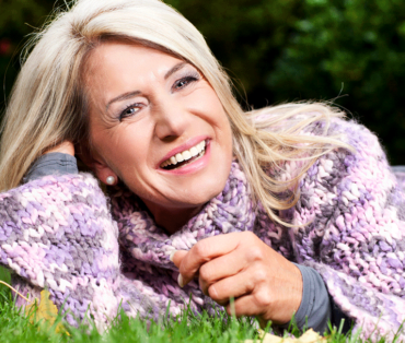 Woman lying down and smiling