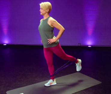 Woman exercising on a mat