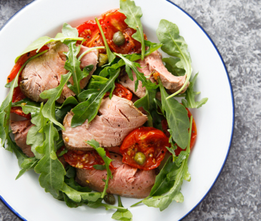 Beef salad with cilantro and arugula